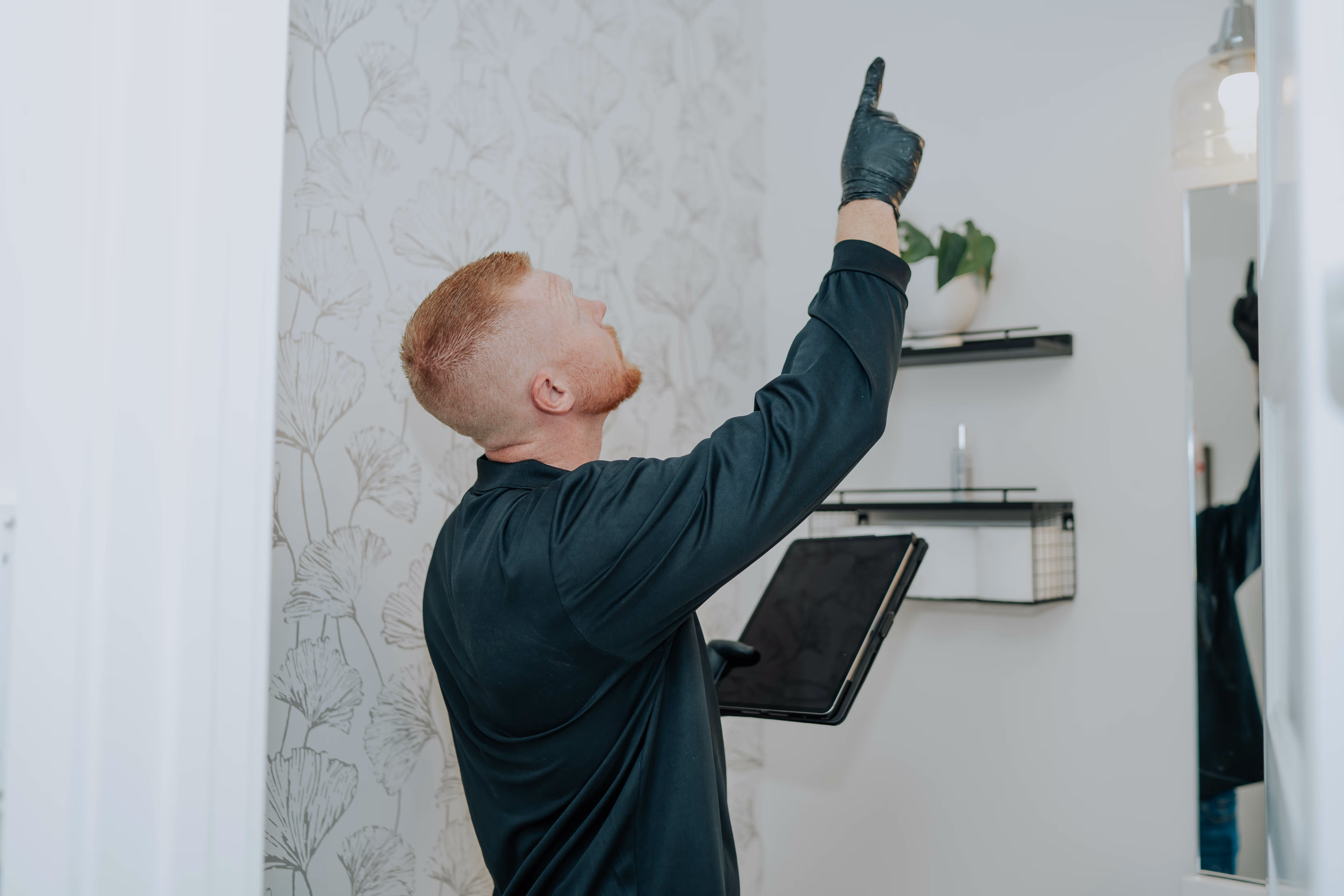 Pure Maintenance of Indy technician conducting a full property mold inspection
